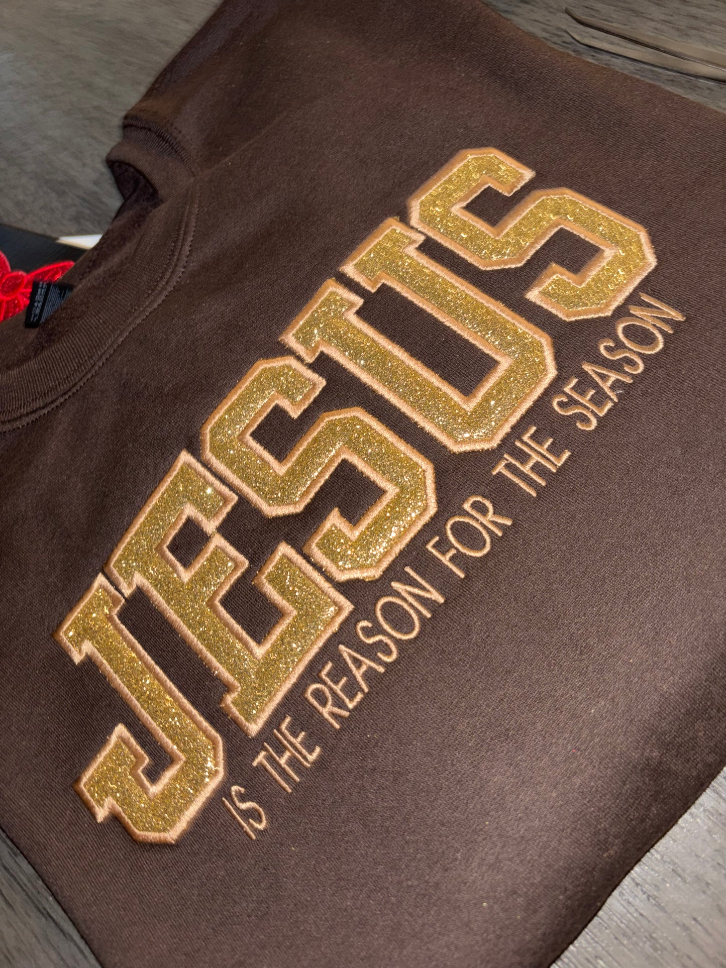 JESUS IS THE REASON FOR THE SEASON EMBROIDERY SWEATSHIRT